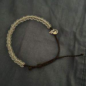 4Ocean black intertwined string.